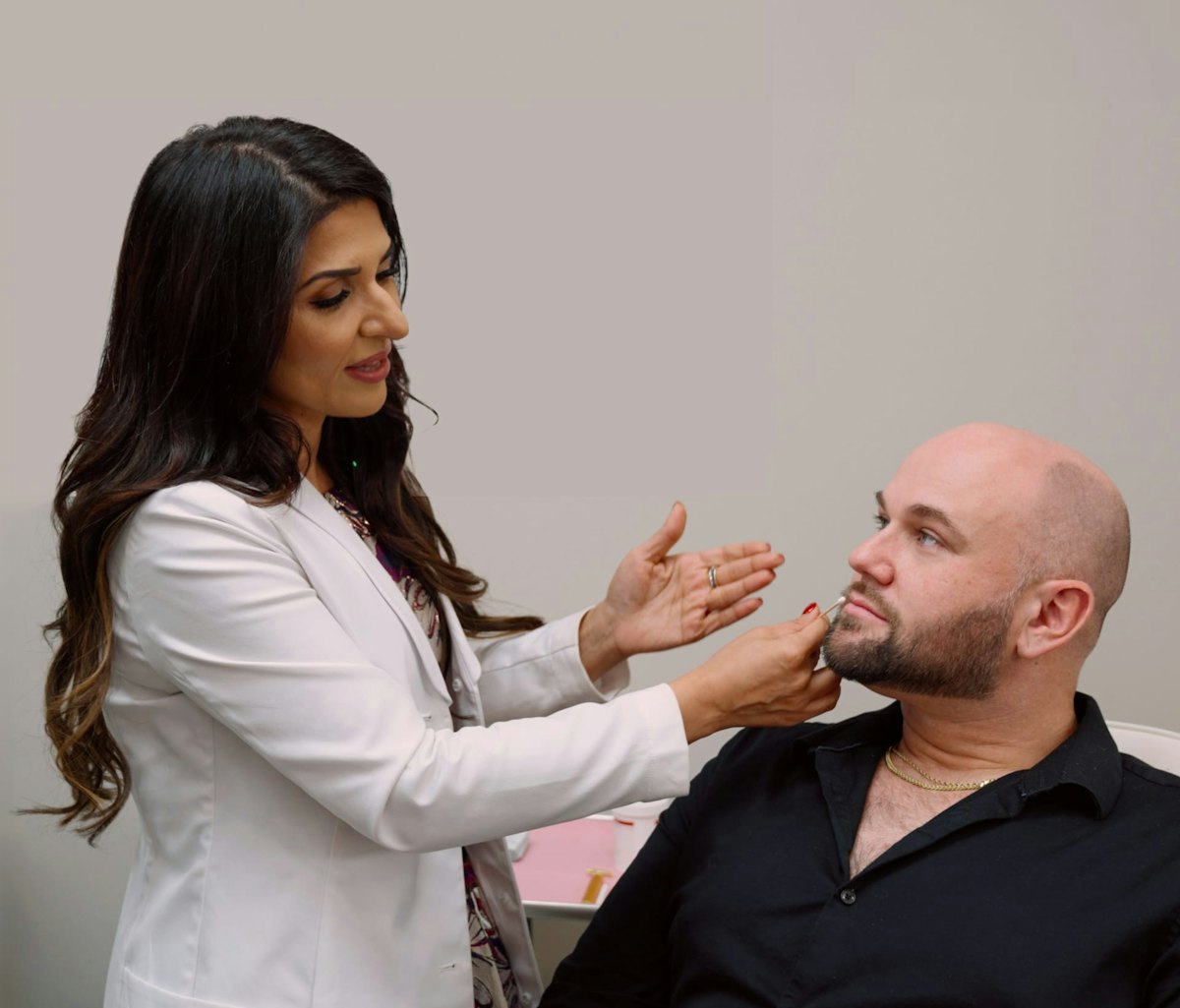 A Neem provider treating a patient